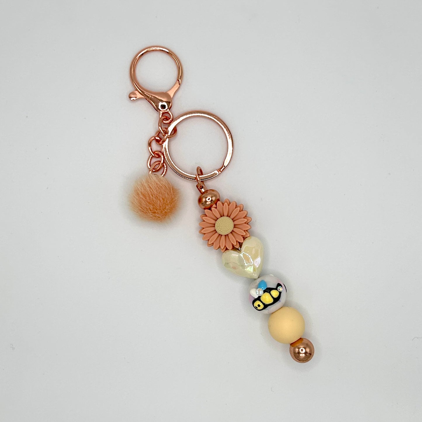 Flower-themed beaded keychain bars