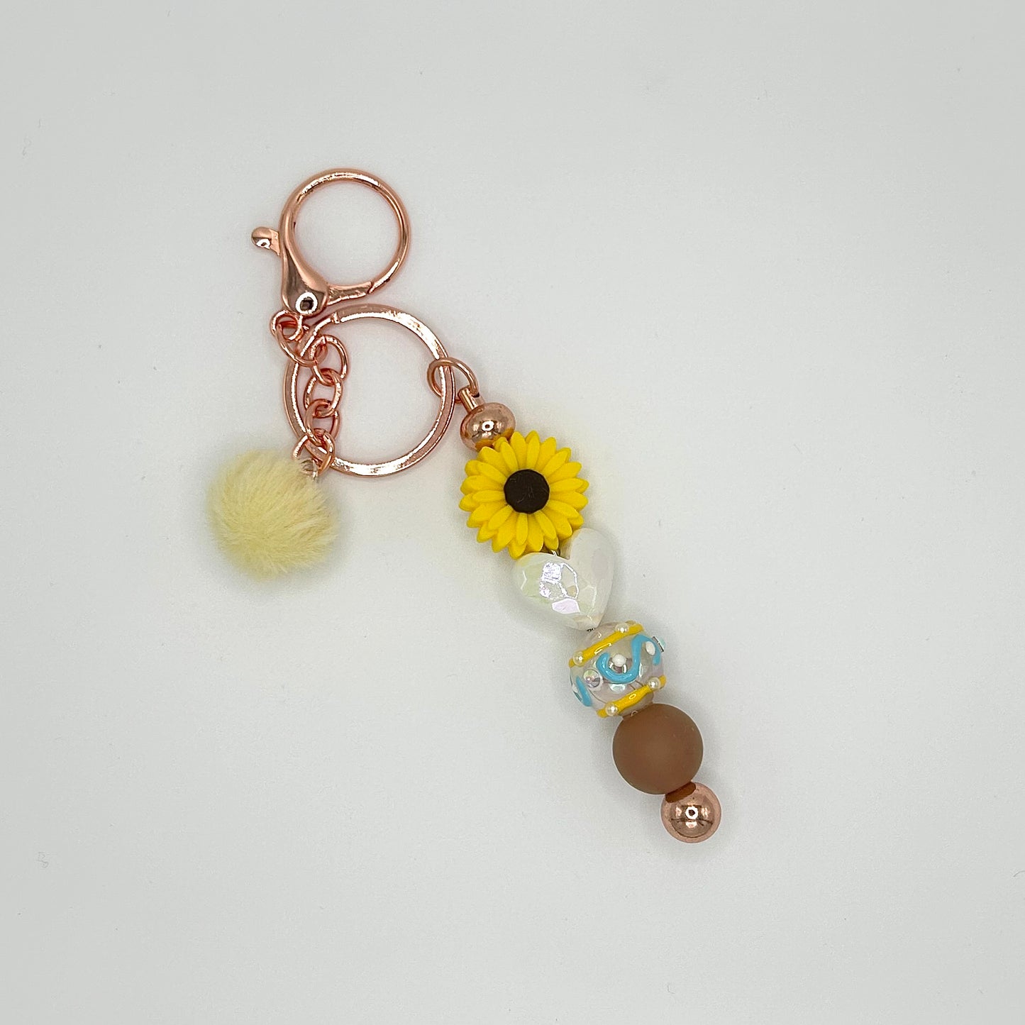 Flower-themed beaded keychain bars