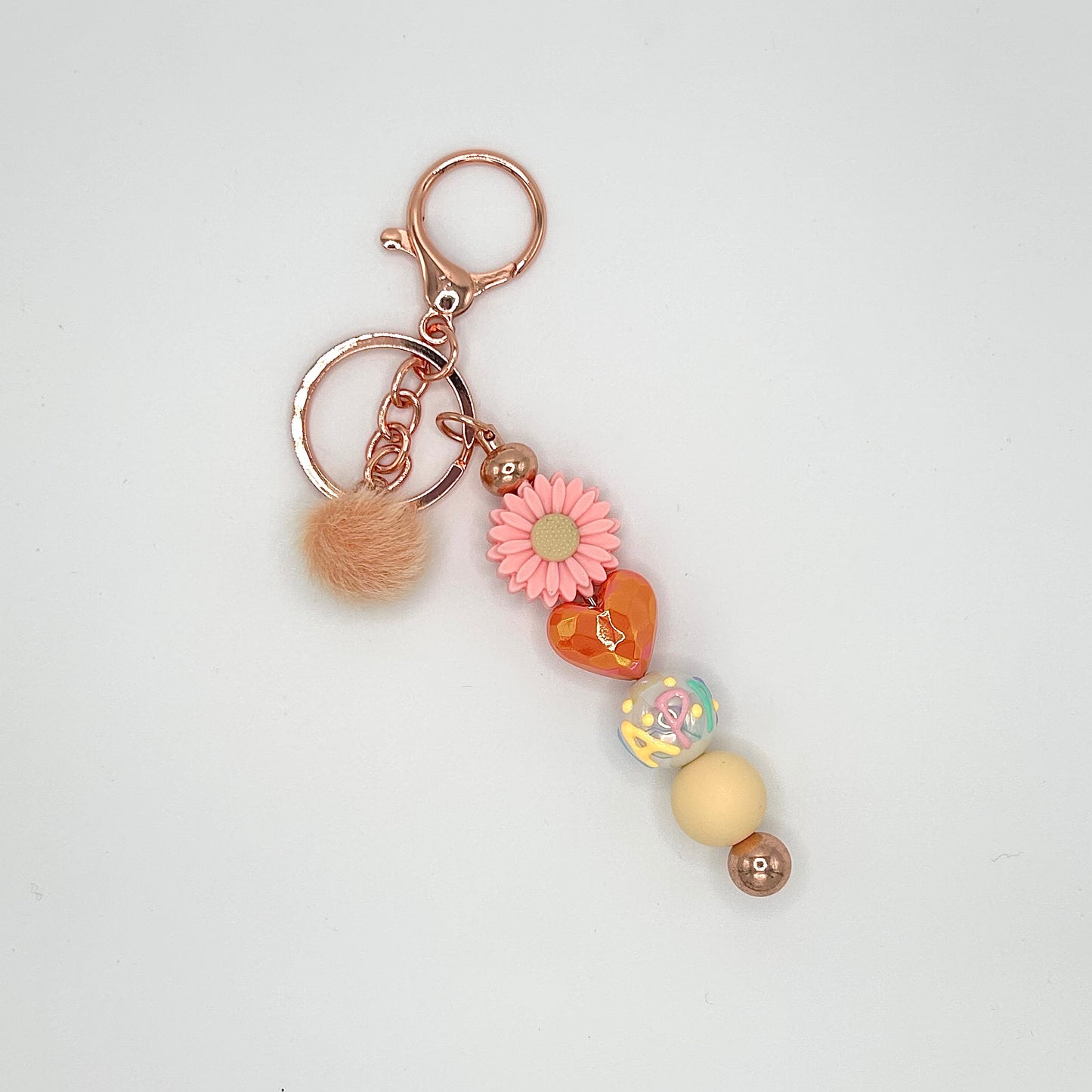 Flower-themed beaded keychain bars