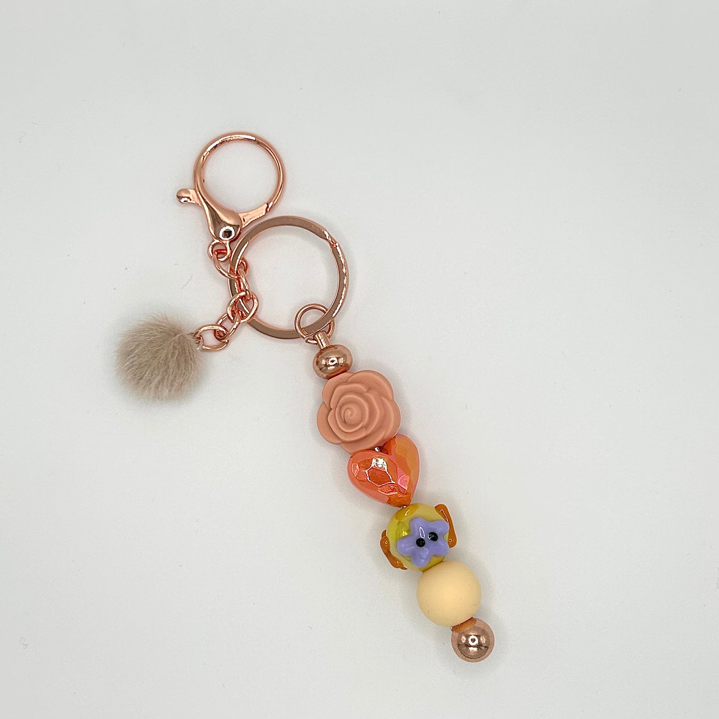 Flower-themed beaded keychain bars